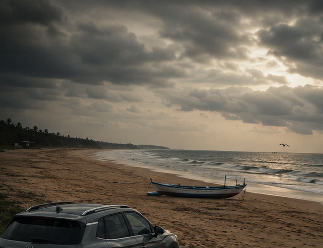A car paused beside an open coast under a cloudy sky